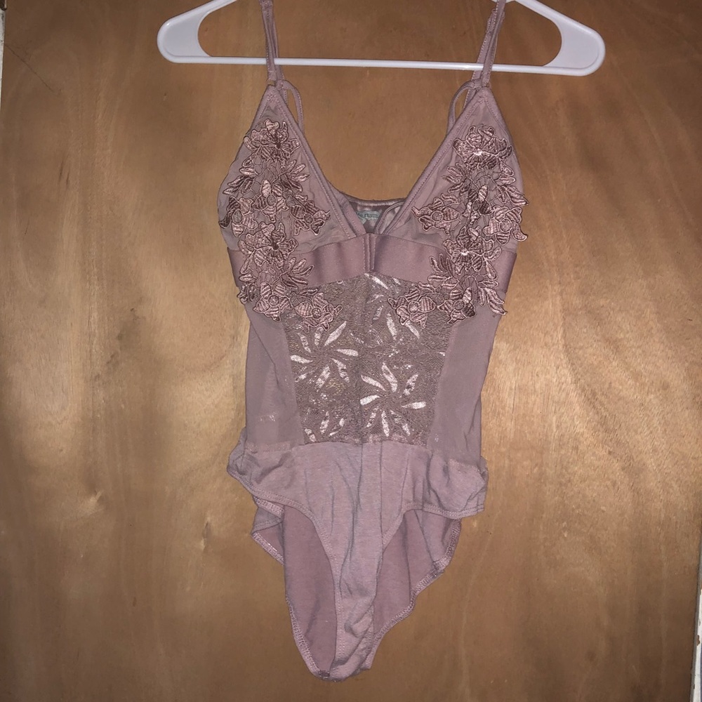 Purple body suit